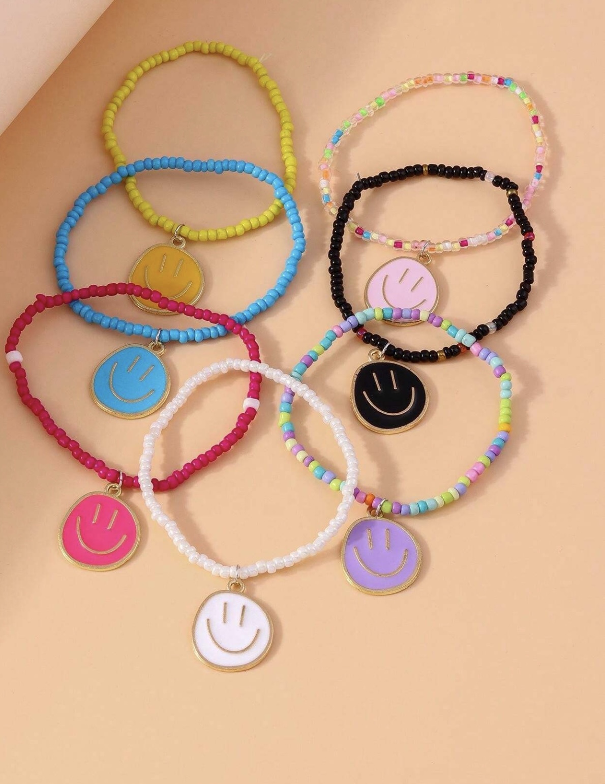  7 أساور من الخرز بوجه مبتسم 😊